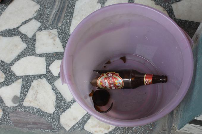 The aftermath of one of Manoj’s tricks – shattering the bottoms of beer bottles by slamming his elbow into the tops. Photo by Sonia Paul.