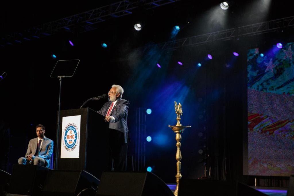 Shalli Kumar, Chairman of the Republican Hindu Coalition addresses attendees before Donald Trump appears as the guest speaker. Photo by: Sara Hylton